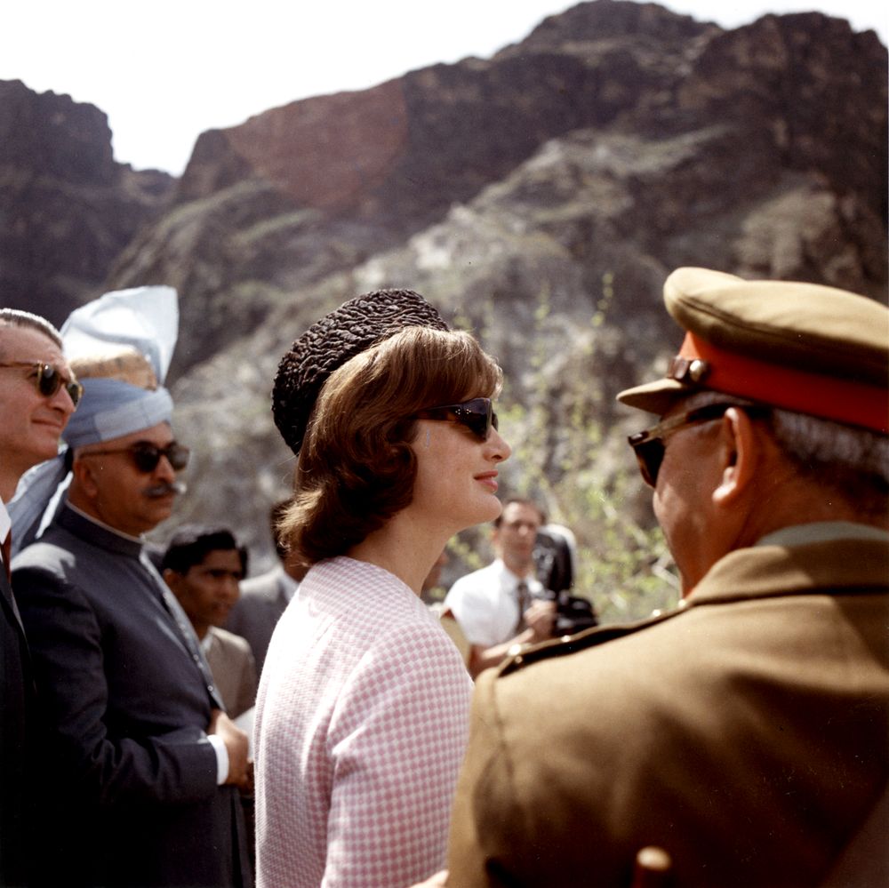 First Lady Jacqueline Kennedy visited the Khyber Pass near Pakistan's western border with Afghanistan. Standing at left: United States Ambassador to Pakistan, Walter P. McConaughy; Governor of West Pakistan, Malik Amir Mohammad Khan